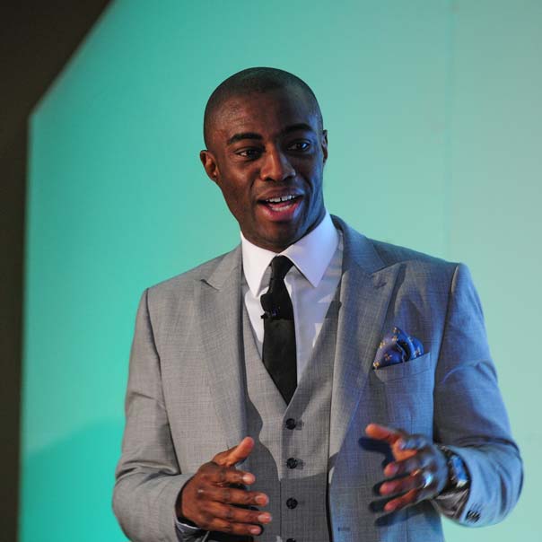 Tim Campbell speaking on stage